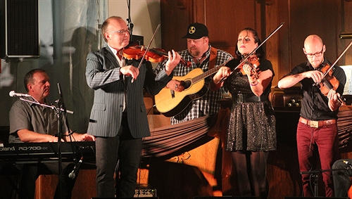 Kyle & Sheumas MacNeil, J.P. Cormier and 2 members of The Fretless at Celtic Colours in Cape Breton.